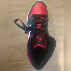 Brand: air Jordans Size:7 Colors: red and black for the riming of the shoe's